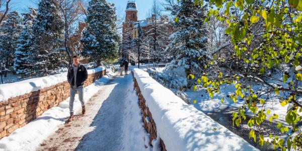 student walking in winter