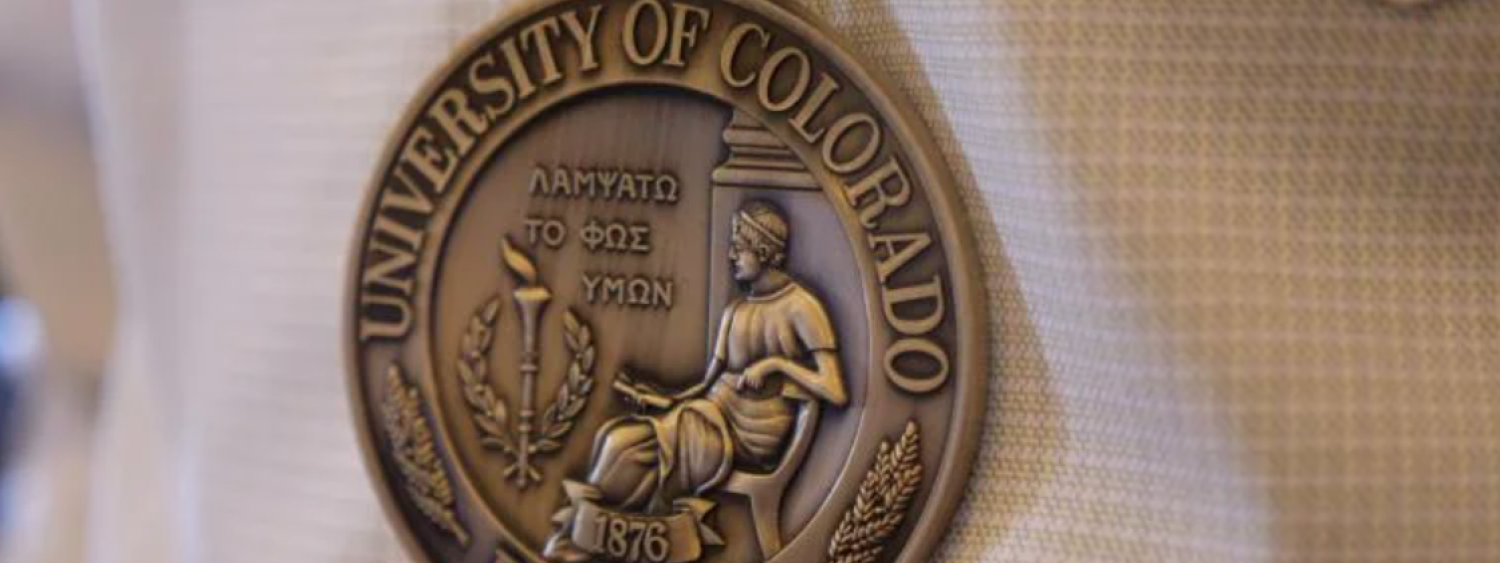 Tenure medal engraved with university seal