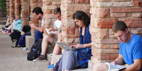 CU students studying outside the University Memorial Center. 