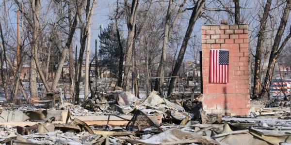 Home burned in the Marshall Fire with American fllag