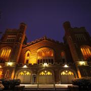 Exterior of Macky Auditorium at night
