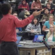 students listen to Professor Eric Cornell's lecture