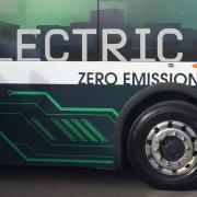 The side of an electric bus.