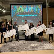 Lab Venture Challenge biosciences winners holding giant checks