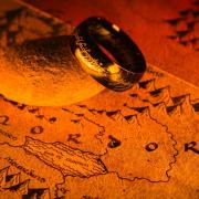 The One Ring lying on a map of Mordor, part of J.R.R. Tolkien's fictional Middle Earth