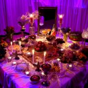 Nowruz table with foods, candles, decor