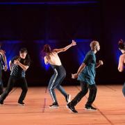 Dancers perform 'Odeon' on stage