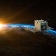 lllustration of small spacecraft orbiting Earth