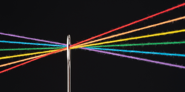 Multicolor threads combined in the eye of a needle